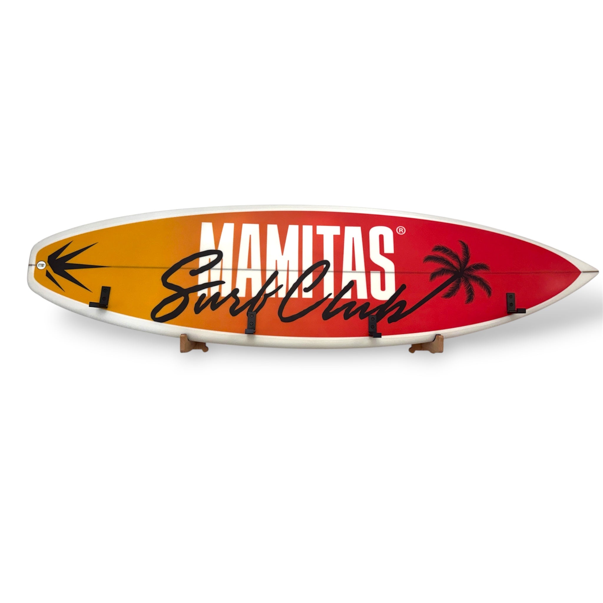 Real yellow, orange and red surfboard wall rack with Surf Club graphics, palm tree design and black coat and towel hooks.